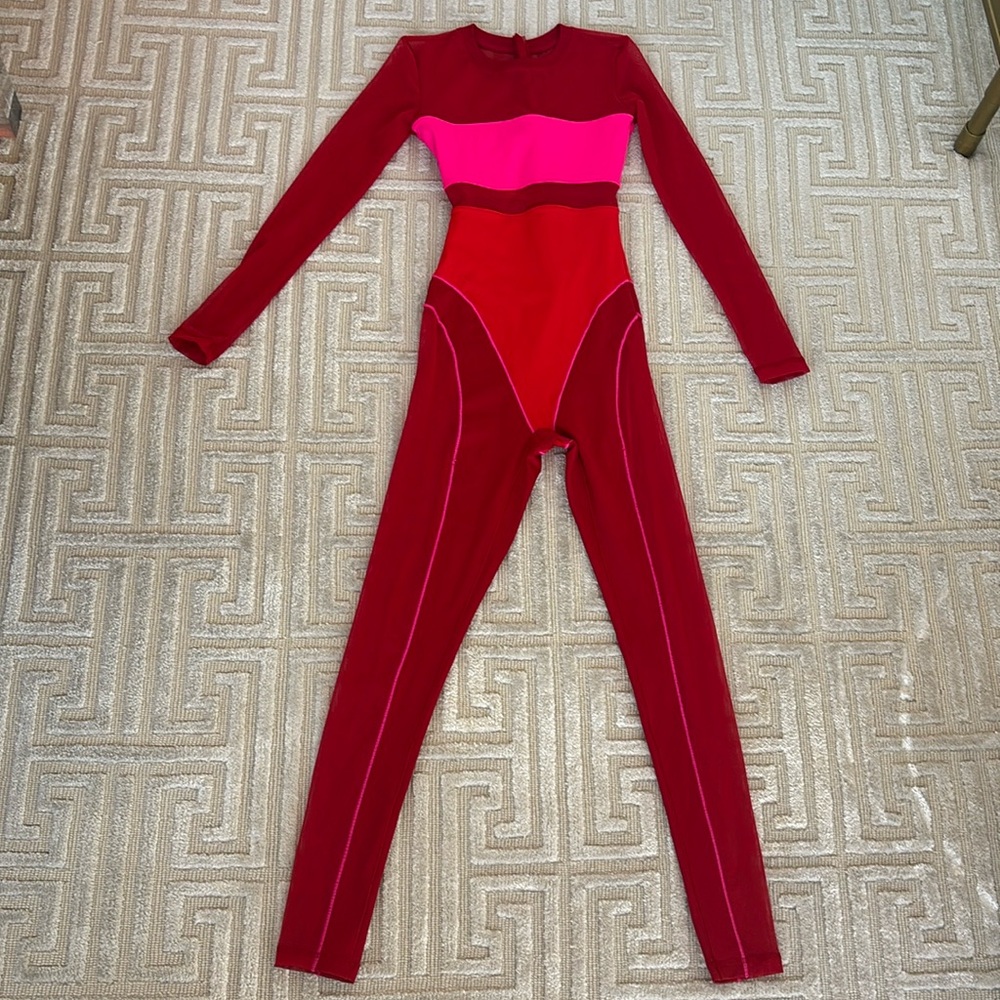 Never worn, amazing unique workout one piece!